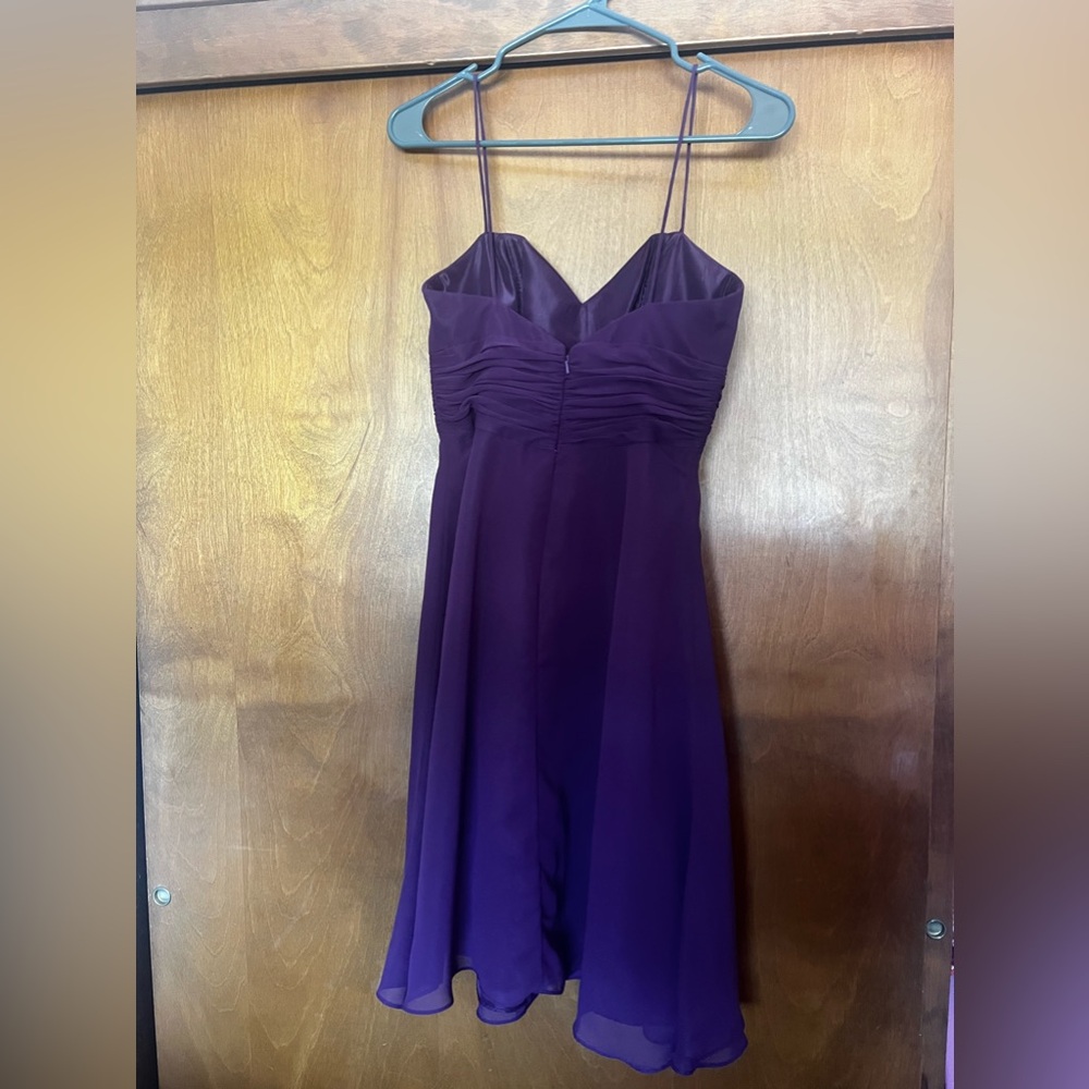 A beautiful royal purple mini dress from Alfred Angelo